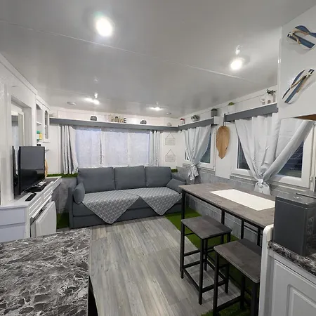 Mobil-home Entre Terre Et مكان تخييم